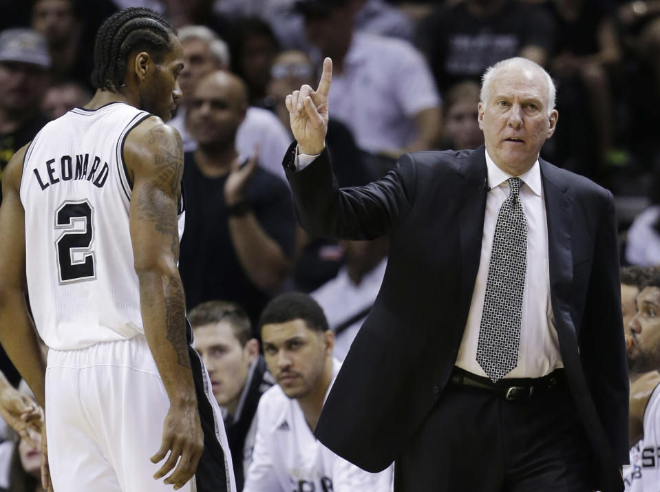 San Antonio Spurs head coach Gregg Popovich could reunited with Kawhi Leonard at Team SA’s minicamp. (AP Photo/David J. Phillip)