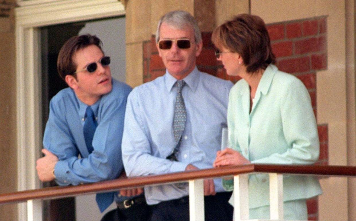 Former prime minister John Major relaxes at The Oval cricket ground, south London, this afternoon (Friday) as his opponant