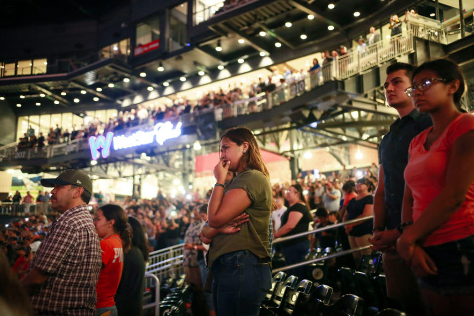 People attend a community memorial service honoring victims of the mass shooting earlier this month which left 22 people dead and 24 more injured, at Southwest University Park on August 14, 2019 in El Paso, Texas. | Sandy Huffaker—Getty Images