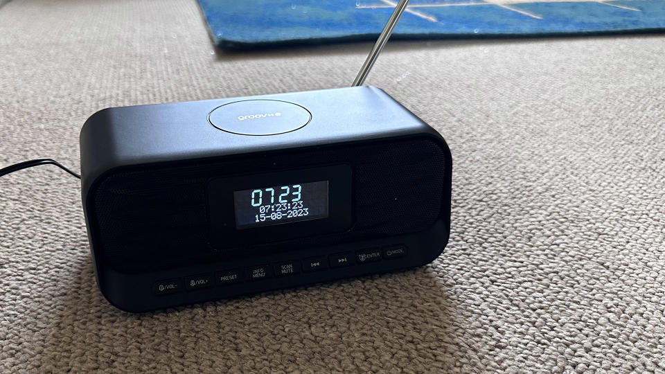 The Groov-E-Zeus DAB FM radio clock against carpet