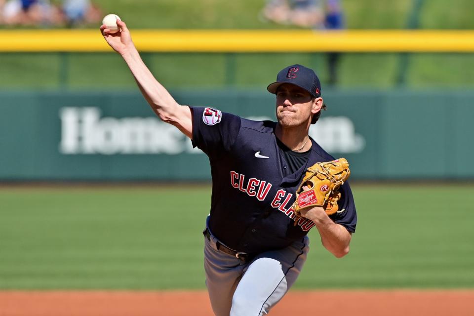 Guardians starter Shane Bieber throws in the first inning against the Cubs during a spring training game, Feb. 27, 2023, in Mesa, Arizona.