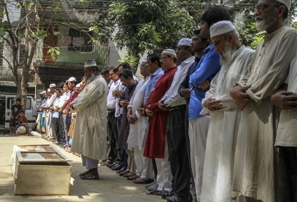 Relatives and friends at the funeral prayer of Bangladeshi activist Xulhaz Mannan in Dhaka in 2016 (AFP via Getty Images)