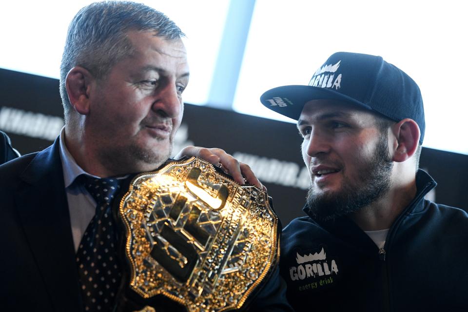 Mixed martial arts (MMA) fighter Khabib Nurmagomedov and and his father Abdulmanap Nurmagomedov give a press conference in Moscow on November 26, 2018. (Photo by Kirill KUDRYAVTSEV / AFP)        (Photo credit should read KIRILL KUDRYAVTSEV/AFP via Getty Images)