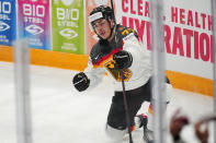 Germany's Daniel Fischbuch (77) celebrates his goal during the gold medal match against Canada at the Ice Hockey World Championship in Tampere, Finland, Sunday, May 28, 2023. (AP Photo/Pavel Golovkin)