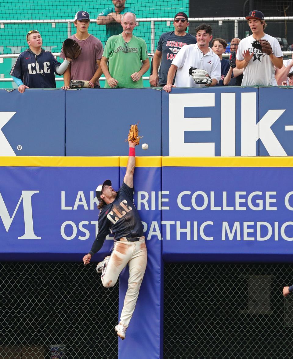 Cleveland Guardians shortstop Daniel Schneemann (10) barely misses a home run ball hit by Seattle Mariners shortstop J.P. Crawford (3) during the third inning of an MLB game at Progressive Field, Tuesday, June 18, 2024, in Cleveland, Ohio.