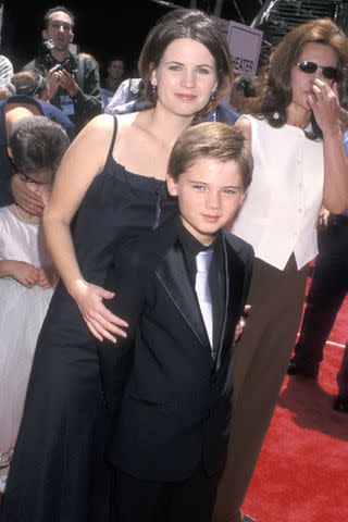 <p>Ron Galella, Ltd./Ron Galella Collection via Getty</p> Lisa Lloyd and son Jake Lloyd