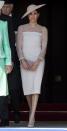 <p>Markle looked beautiful in a silk crepe pencil dress by <a class="link " href="http://www.goatfashion.com/" rel="nofollow noopener" target="_blank" data-ylk="slk:Goat;elm:context_link;itc:0;sec:content-canvas">Goat</a> for her first appearance since her wedding. She teamed the look with <a class="link " href="http://vanessa-tugendhaft.com/en/collection-idylle/619-idylle-earring-la-rose-diamonds.html" rel="nofollow noopener" target="_blank" data-ylk="slk:Vanessa Tugendhaft earrings;elm:context_link;itc:0;sec:content-canvas">Vanessa Tugendhaft earrings</a>, and a bespoke hat by Philip Treacy, according to fashion blog Meghan's Mirror. She carried an oyster-coloured clutch, believed to be from British accessories brand, <a class="link " href="https://www.wilburandgussie.com/collections/all-handbags/products/edith-oyster-clutch-bag" rel="nofollow noopener" target="_blank" data-ylk="slk:Wilbur and Gussie;elm:context_link;itc:0;sec:content-canvas">Wilbur and Gussie</a>.</p>