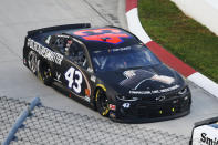 Bubba Wallace (43) drives during a NASCAR Cup Series auto race Wednesday, June 10, 2020, in Martinsville, Va. (AP Photo/Steve Helber)