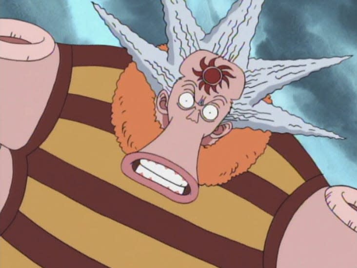 hachi the octopus fish man in one piece the anime. he has spiky hair and a sun tattoo on his forehead