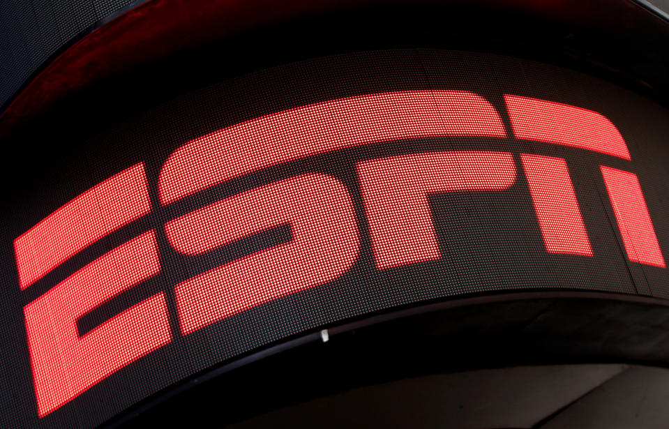 The ESPN logo is seen on an electronic display in Times Square in New York City, U.S., August 23, 2017.  REUTERS/Mike Segar