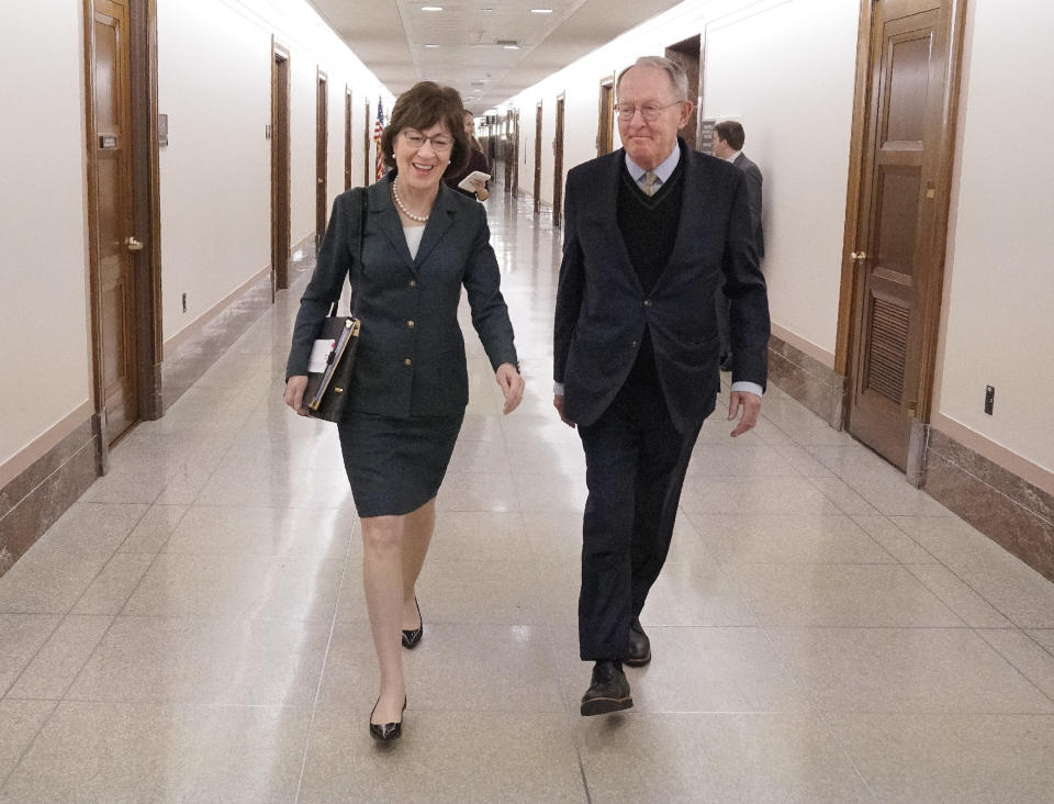 Sen. Susan Collins (R-Maine) walks with Sen. Lamar Alexander (R-Tenn.) after a hearing on Capitol Hill on Dec. 12, 2017.&nbsp; (Photo: Staff Photo by Gregory Rec/Portland Press Herald via Getty Images)