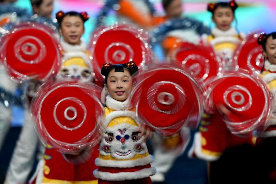 Children perform in the pre-show during the opening ceremony of the 2022 Winter Olympics, Friday, Feb. 4, 2022, in Beijing. (AP Photo/David J. Phillip)