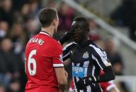 Football - Newcastle United v Manchester United - Barclays Premier League - St James' Park - 4/3/15. Manchester United's Jonny Evans clashes with Newcastle's Papiss Cisse. Action Images via Reuters / Lee Smith