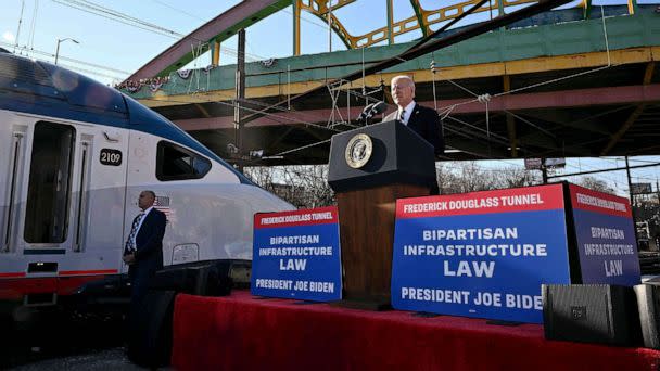 PHOTO: US President Joe Biden delivers remarks on how the Bipartisan Infrastructure Law will provide funding to replace the 150 year old Baltimore and Potomac Tunnel, at the Baltimore and Potomac Tunnel North Portal in Baltimore, Jan. 30, 2023. (Mandel Ngan/AFP via Getty Images)