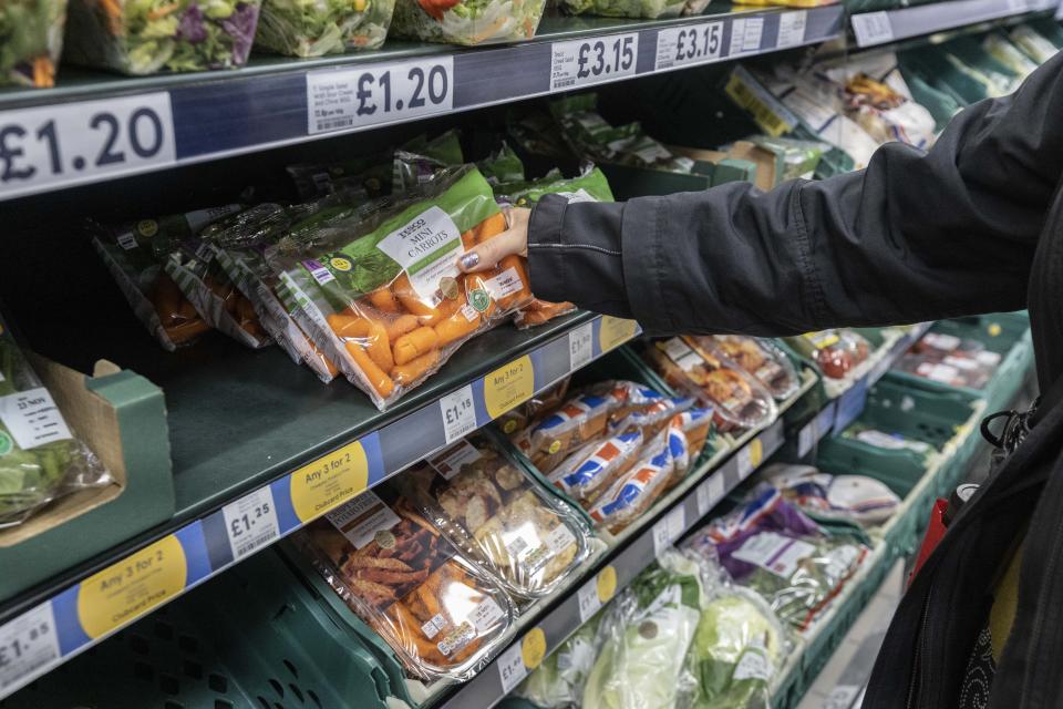 LONDON, UNITED KINGDOM - NOVEMBER 16: A woman is seen shopping in a supermarket, as the UK inflation rises to 11.1 percent due to rising food prices in London, United Kingdom on November 16, 2022. (Photo by Rasid Necati Aslim/Anadolu Agency via Getty Images)