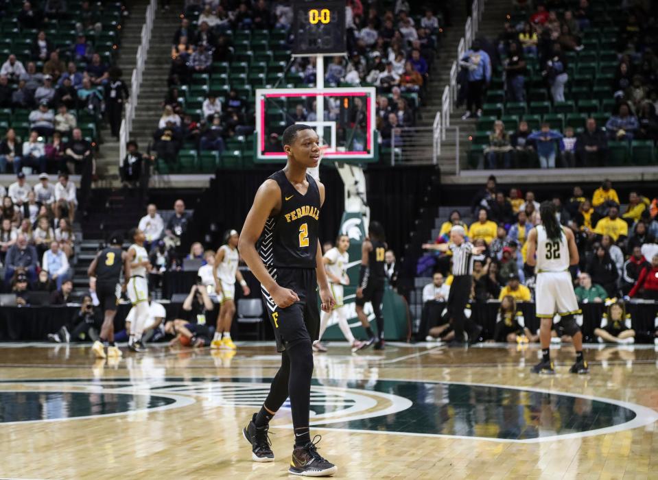 Ferndale guard Caleb Renfroe (2) walks off the court after a 65-60 win over Saginaw in the MHSAA boys Division 2 semifinal at Breslin Center in East Lansing on Friday, March 24, 2023.