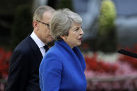 Britain's Prime Minister Theresa May speaks before leaving 10 Downing Street, London for Buckingham Palace, Wednesday, July 24, 2019. Boris Johnson will replace May as Prime Minister later Wednesday, following her resignation last month after Parliament repeatedly rejected the Brexit withdrawal agreement she struck with the European Union. (AP Photo/Matt Dunham)