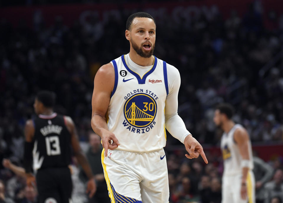 LOS ANGELES, CA - MARCH 15: Stephen Curry #30 of the Golden State Warriors celebrates after scoring a three-point basket against the Los Angeles Clippers during the first half of the game at Crypto.com Arena on March 15, 2023 in Los Angeles, California. NOTE TO USER: User expressly acknowledges and agrees that, by downloading and or using this photograph, User is consenting to the terms and conditions of the Getty Images License Agreement. (Photo by Kevork Djansezian/Getty Images)