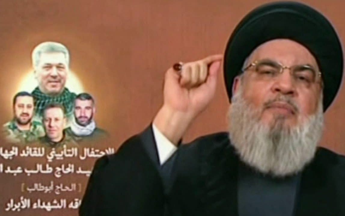 Hezbollah chief Hassan Nasrallah giving a televised address from an undisclosed location in Lebanon on Wednesday