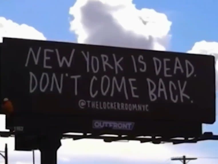 <p>The humorous billboard sitting high above Sunset Boulevard reads: ‘New York is Dead. Don’t come back’</p> (Dash Two Media)