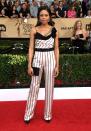 <p>Naomie said bye bye to uncomfortable gowns and hello to this amazing striped jumpsuit by Lanvin. <i>[Photo: Getty]</i> </p>