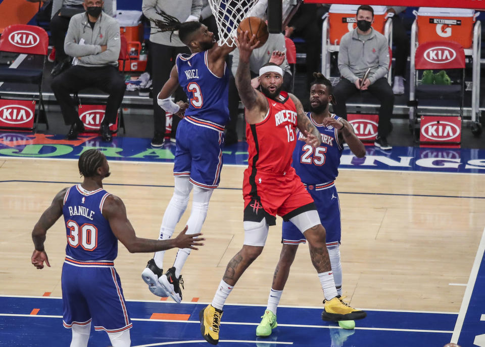 Houston Rockets center DeMarcus Cousins (15) shoots a reverse layup against the New York Knicks during the first quarter of an NBA basketball game Saturday, Feb. 13, 2021, in New York. (Wendell Cruz/Pool Photo via AP)