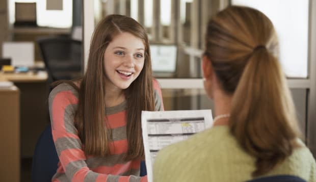 Student talking to guidance counselor