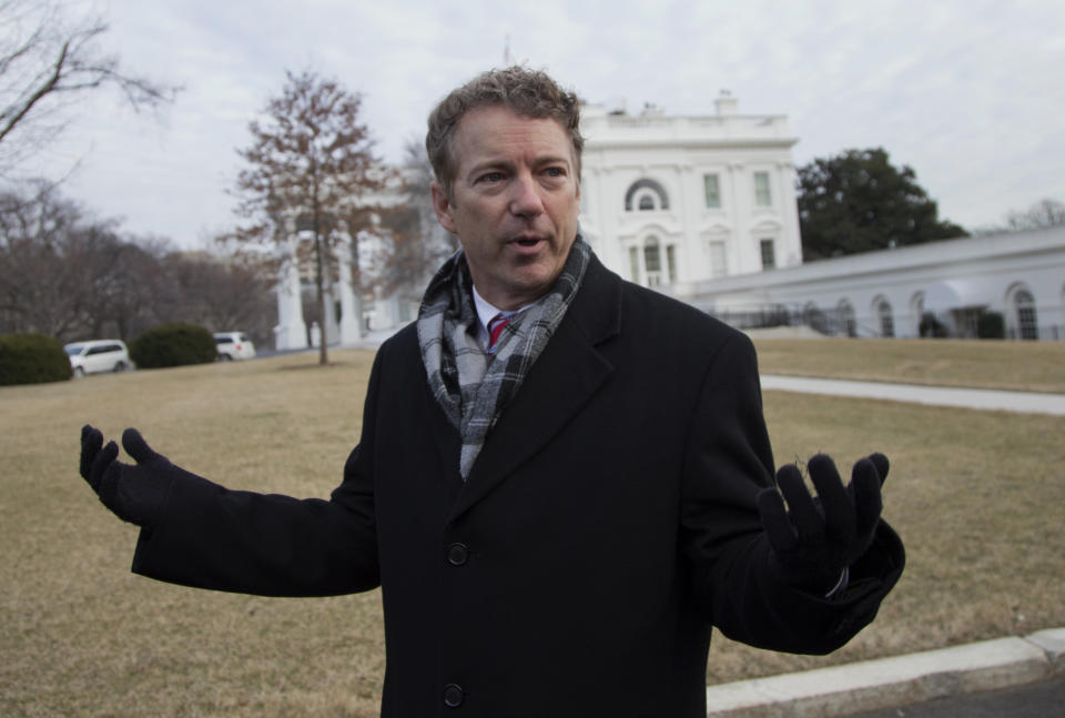 Sen. Rand Paul, R-Ky., talks to media outside the White House in Washington, Thursday, Jan. 9, 2014, after an event hosted by President Barack Obama about the Promise Zones Initiative. The Promise Zone Initiative is part of a plan to create a better bargain for the middle-class by partnering with local communities and businesses to create jobs, increase economic security, expand educational opportunities, increase access to quality, affordable housing and improve public safety. (AP Photo/Carolyn Kaster)