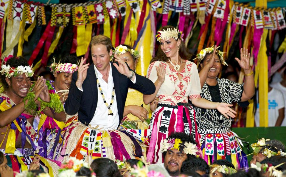 <p>Perhaps saving the best for last, Prince William and Kate Middleton spent their final day on a 2012 tour of Southeast Asia savoring local flavors and traditions — including Polynesian-style grass skirts and floral headwear — in Tuvalu while representing Queen Elizabeth on a trip to the South Pacific for the monarch's Diamond Jubilee Tour.</p>