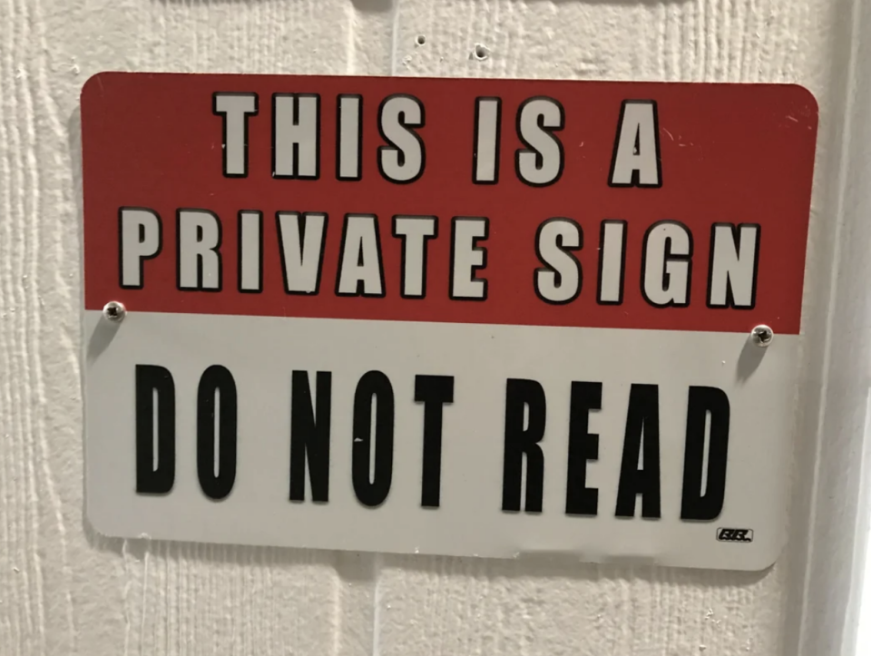 Sign with text: "THIS IS A PRIVATE SIGN. DO NOT READ."