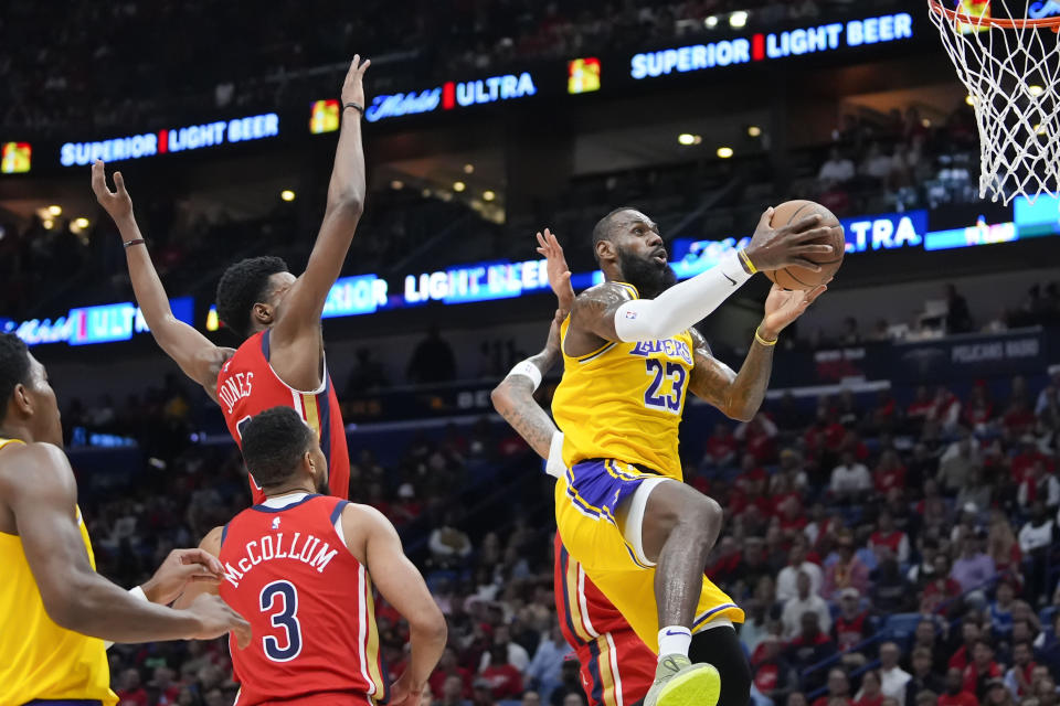 LeBron James and the Lakers are scheduled to play the Denver Nuggets in a rematch of last year's Western Conference Finals.  (AP Photo/Gerald Herbert)