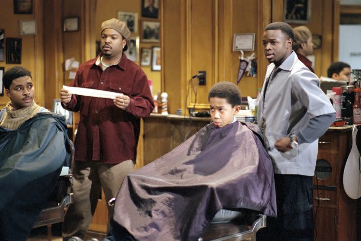 Ice Cube and Sean Patrick Thomas giving some customers some cuts in ‘Barbershop’ (Photo: MGM/courtesy Everett Collection)