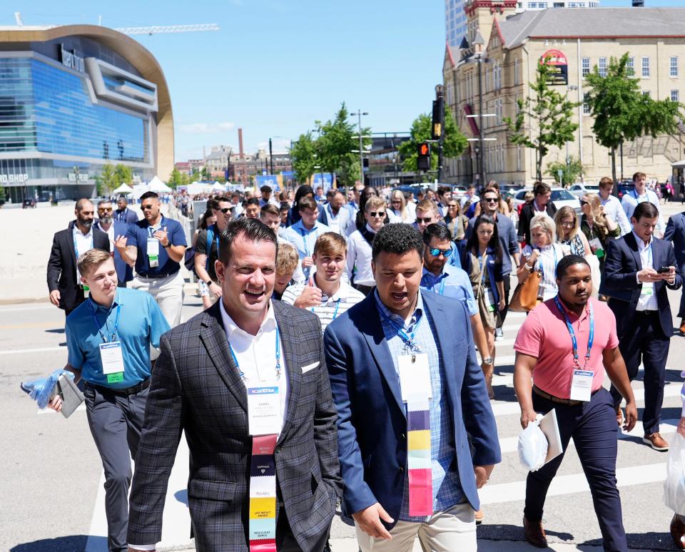 Northwestern Mutual employees depart from the annual conference on Monday, July 25, 2022, at Fiserv Forum in Milwaukee.