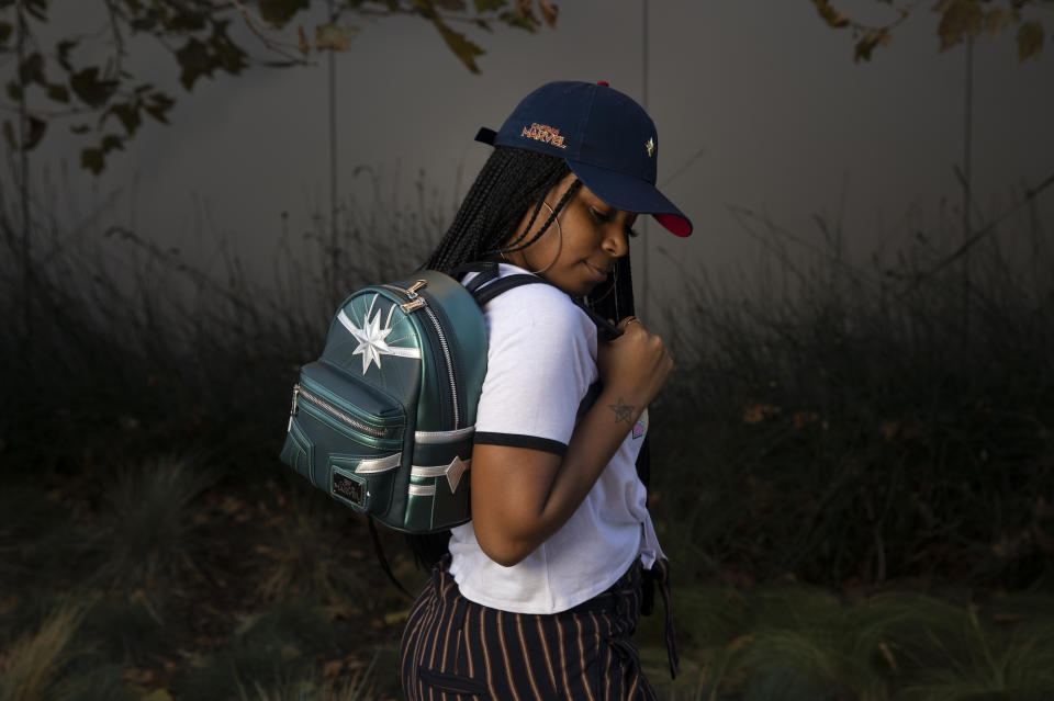 <span>Captain Marvel bag ($64) and hat ($24) </span>(Photo: Loungefly/New Era)