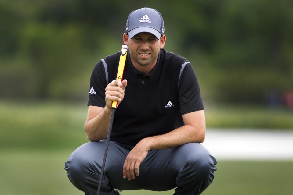 Sergio Garcia lines his putt up on the eighteenth hole during the third round of the Houston Open golf tournament on Saturday, April 5, 2014, in Humble, Texas. (AP Photo/Patric Schneider)