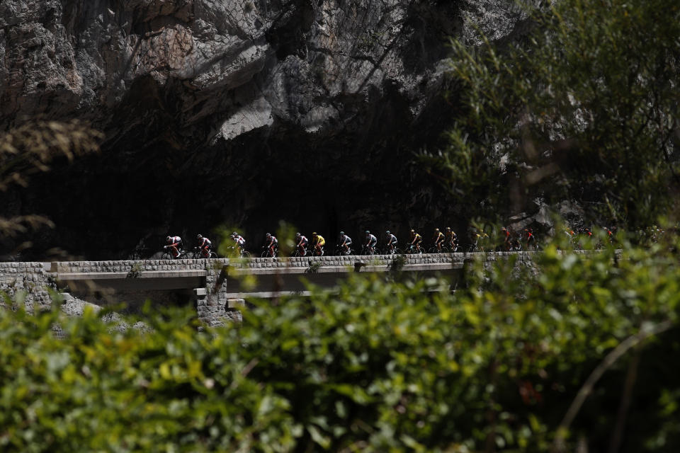 The pack rides during the second stage of the Tour de France cycling race over 186 kilometers (115,6 miles) with start and finish in Nice, southern France, Sunday, Aug. 30, 2020. (AP Photo/Thibault Camus)