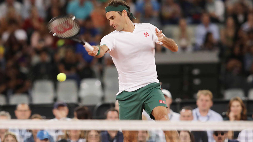 Roger Federer, pictured here at a charity event in South Africa in February.