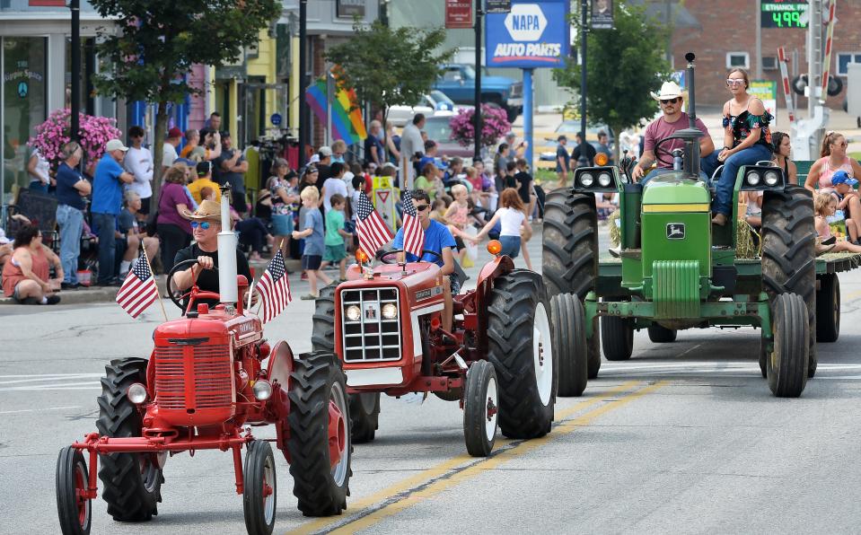 Participants drive tractors in August in the Dan Rice Days Parade in Girard, Erie County. Erie is projected to grow minimally by 2050 in a new study by the Center for Rural Pennsylvania that sees difficulties for rural counties without population hubs such as the city of Erie, 21 miles west of Girard.