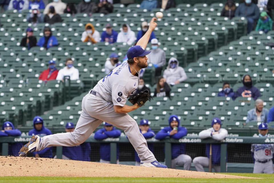 Los Angeles Dodgers starting pitcher Clayton Kershaw throws the ball against the Chicago Cubs during the first inning of the first baseball game of a doubleheader Tuesday, May, 4, 2021, in Chicago. (AP Photo/David Banks)