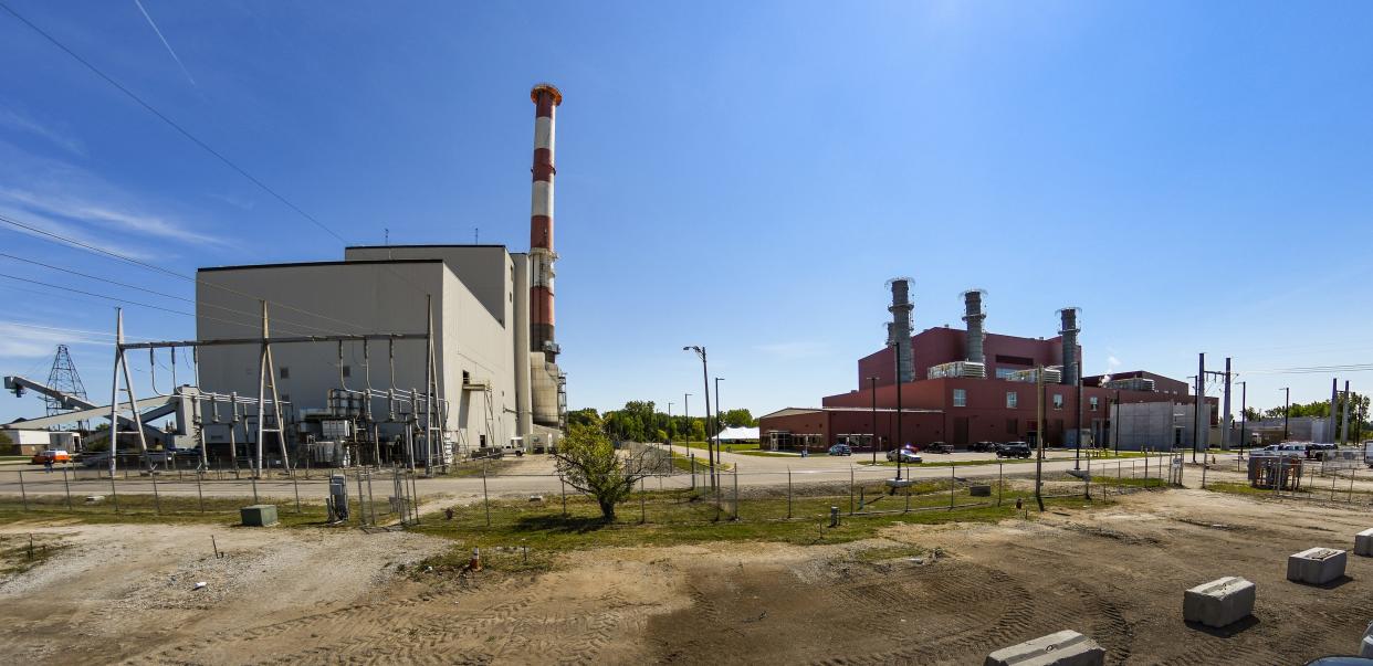 The Lansing Board of Water & Light's Erickson Station (left), and the new Delta Energy Park station, which has been online since March 2022, in Delta Township. The coal-fired Erickson Station went offline in November of 2022, and the utility plans to build a new plant there.