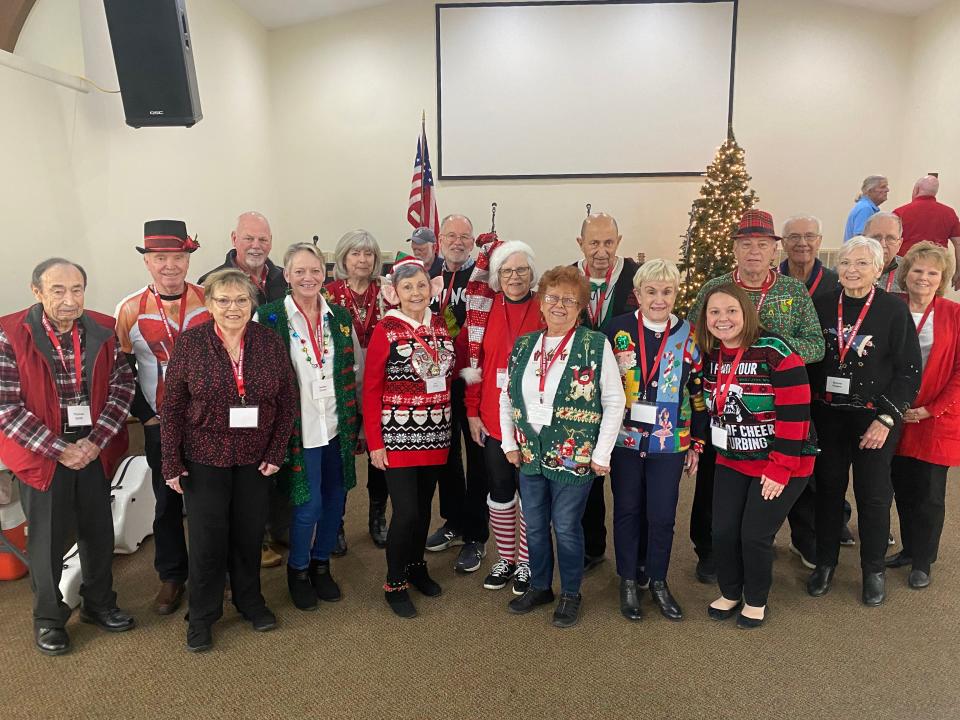 PK HOPE IS ALIVE Parkinson’s Support Group of Knoxville/Oak Ridge had a festive Christmas party on Dec. 21, 2021 with plenty of food, music and fellowship! Front row, from left: Thomas and Christine Smith, Debbie Danial, Pat Frye, Margaret Smith, Bonnie Carroll, Karen Flitcroft, Laura Richmond, Bonnie Rogers, and Pam Collier. Back row: Larry Frye, Freddy Danial, JoAnn Knies, Peter Dueber, David Flitcroft, Jim Brown, Bill Rogers, and Mike Collier. We wish you a Merry Christmas and a Happy New Year! Our first meeting of 2022 will be Tuesday, Jan. 18 at Central Baptist Church in Oak Ridge.