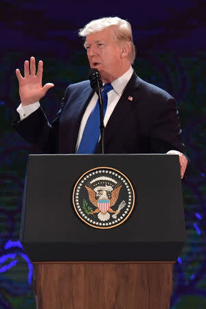 U.S. President Donald Trump speaks on the final day of the APEC CEO Summit, part of the broader Asia-Pacific Economic Cooperation (APEC) leaders' summit, in Danang, Vietnam, November 10, 2017. REUTERS/Anthony Wallace/Pool