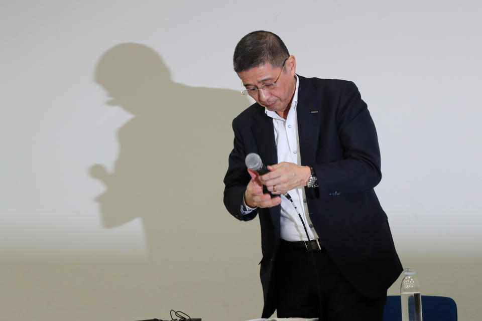 Nissan Chief Executive Hiroto Saikawa prepares to leave a press conference in the automaker's headquarters in Yokohama, near Tokyo, Monday, Sept. 9, 2019. Saikawa tendered his resignation Monday after acknowledging that he had received dubious income and vowed to pass the leadership of the Japanese automaker to a new generation. (AP Photo/Koji Sasahara)