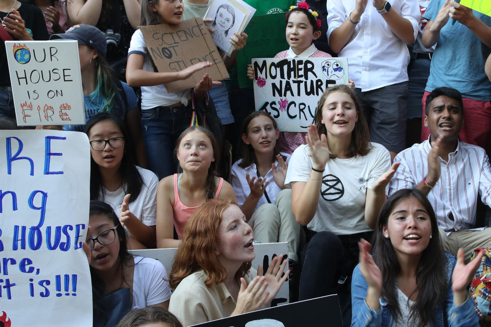 Swedish environmental activist Greta Thunberg, center left, participates in a Youth Climate Strike outside the United Nations, Friday, Aug. 30, 2019 in New York. Thunberg is scheduled to address the United Nations Climate Action Summit on September 23. (AP Photo/Mary Altaffer)