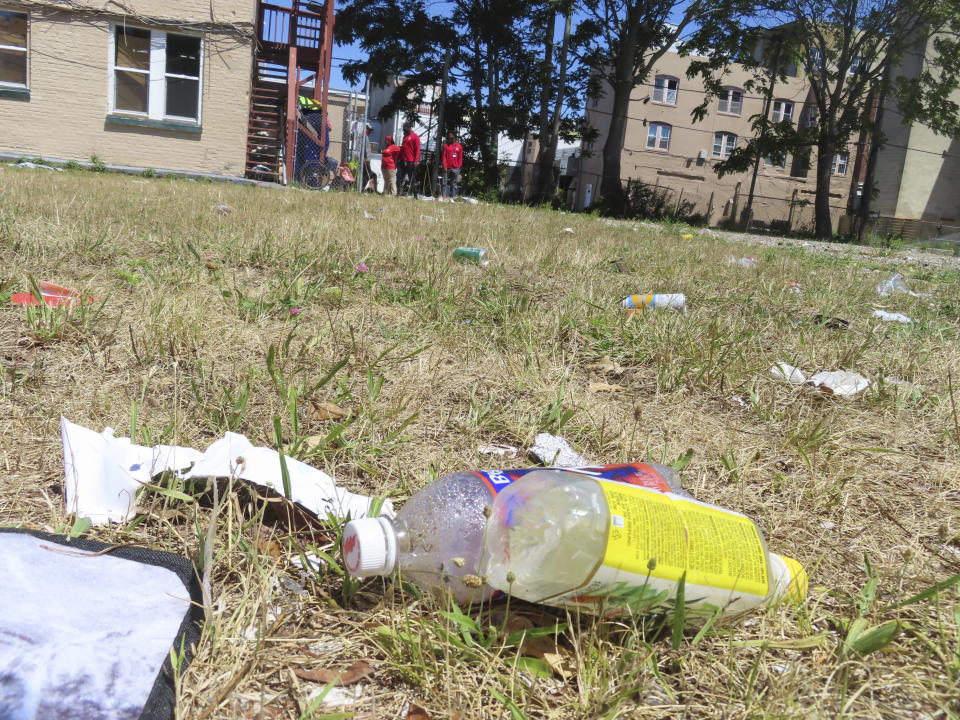 Trash litters a vacant lot in Atlantic City N.J., on Monday, July 1, 2024, as city outreach workers look for homeless people as part of an effort to address homelessness in the gambling resort. (AP Photo/Wayne Parry)