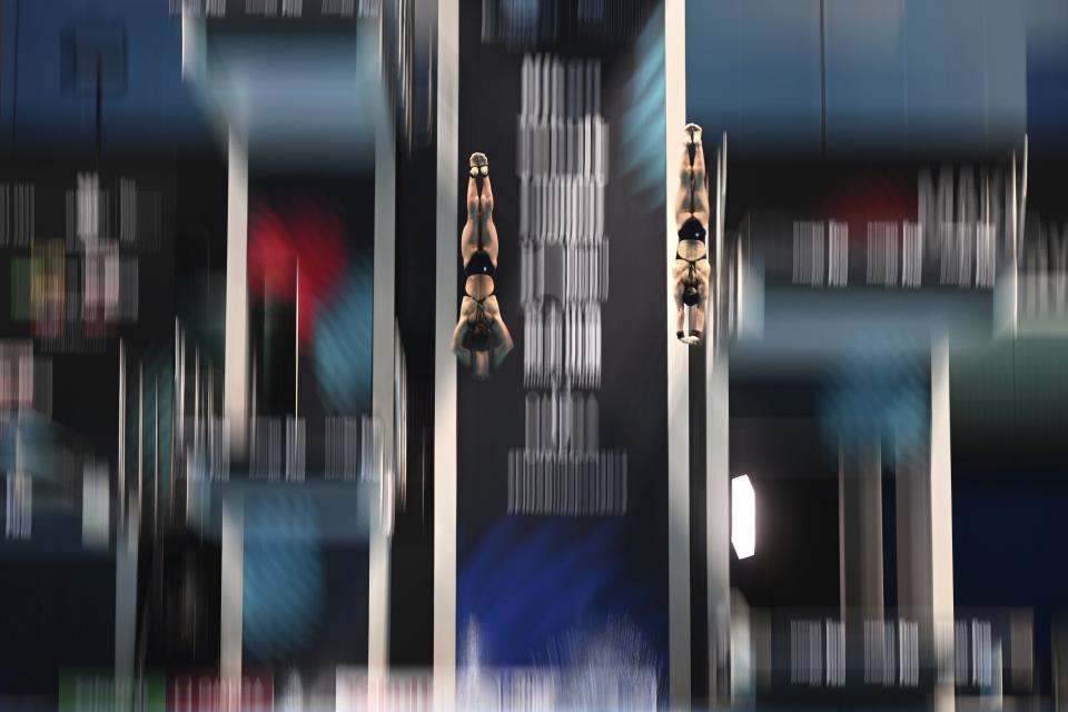 Malaysia's Pandelela Pamg and Nur Dhabitah Sabri compete during the women's synchronised 10m platform at the 19th FINA World Championships in Budapest, Hungary, Thursday, June 30, 2022. (AP Photo/Anna Szilagyi)