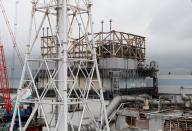 A view of the top of the damaged No.1 reactor building is seen at tsunami-crippled Fukushima Daiichi nuclear power plant in Okuma town, Fukushima prefecture, Japan