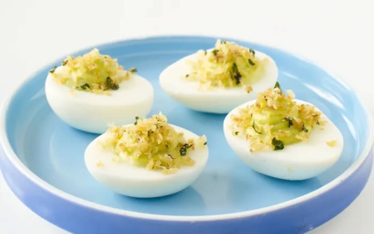 <p>Dash</p><p>Panko breadcrumbs give these a great crunch factor.</p><p><strong>Get the recipe: <a href="https://parade.com/19415/dash/pesto-crunch-deviled-eggs/" rel="nofollow noopener" target="_blank" data-ylk="slk:Pesto Crunch Deviled Eggs;elm:context_link;itc:0;sec:content-canvas" class="link rapid-noclick-resp">Pesto Crunch Deviled Eggs</a></strong></p>