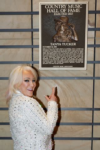 <p>Jason Kempin/Getty</p> Honoree Tanya Tucker attends the Class of 2023 Medallion Ceremony at Country Music Hall of Fame and Museum on Oct. 22, 2023 in Nashville