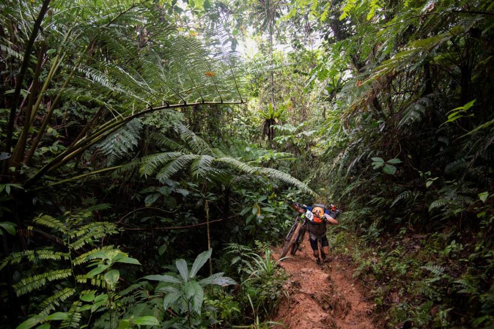 Team Iron Cowboy, featuring team members Sonja Wieck, James Lawrence, Shaun Christian, Aaron Hopkinson and Joe Morton, make their way through the jungle during the 2019 Eco-Challenge adventure race in Fiji on Thursday, September 12, 2019. 